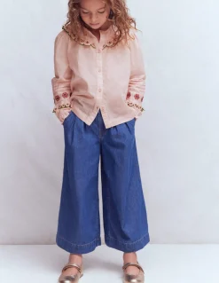 Blouse à empiècement volanté