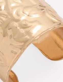 Bracelet manchette à poinçon cœur