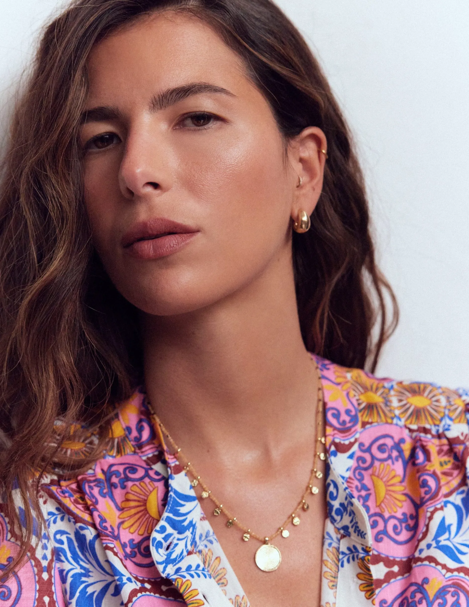 Collier court à rangées de perles