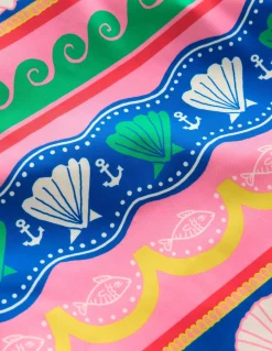 Haut de plage à motif et protection solaire