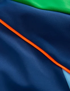 Haut de plage colourblock avec protection solaire