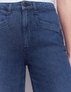 Jean large à poches passepoilées