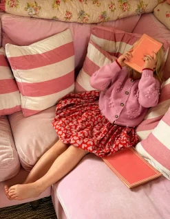 Joli cardigan à pompons