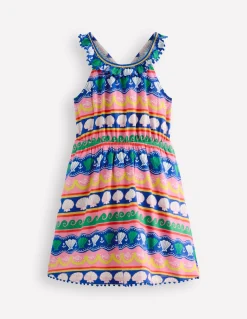 Robe dos-nu à col volanté