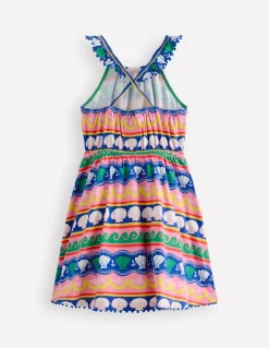 Robe dos-nu à col volanté