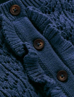 Robe en maille volantée à col tunisien