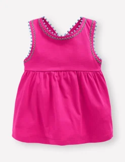 Top à dos croisé détail pompons