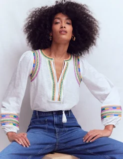 Top brodé à col cranté