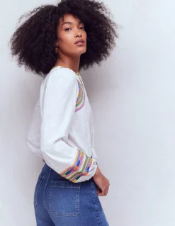 Top brodé à col cranté