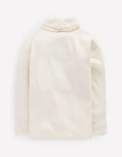 Top côtelé à col roulé