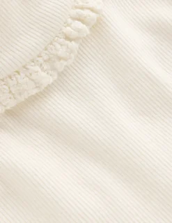 Top côtelé à col roulé