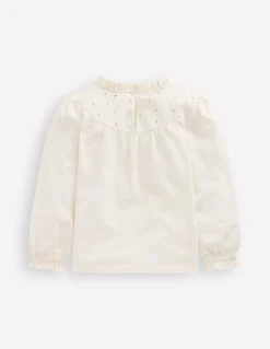 Top en jersey et broderie anglaise cœur