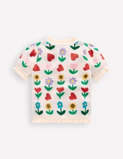 Top en maille à volants