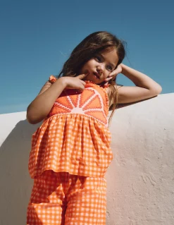 Top fantaisie à bretelles